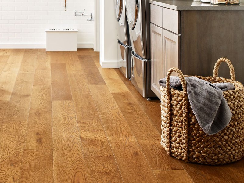 Basket laundry on a brown hardwood from the Floor Store and Design in Columbia