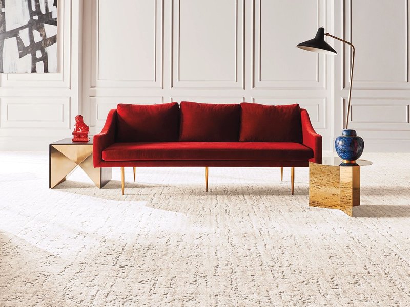 red sofa on beige carpet from Floor Store and Design in Columbia, TN